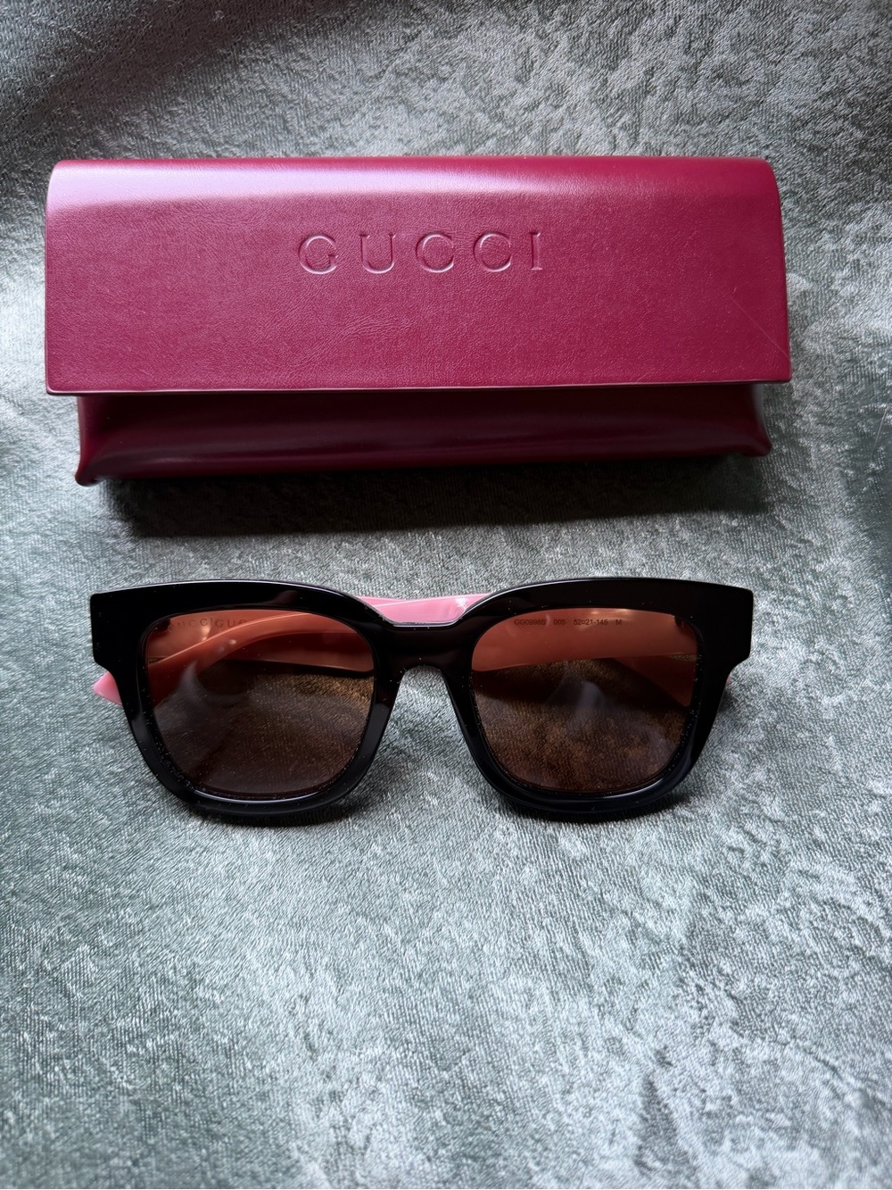 Gucci Black Frame Sunglasses with Pink Temples